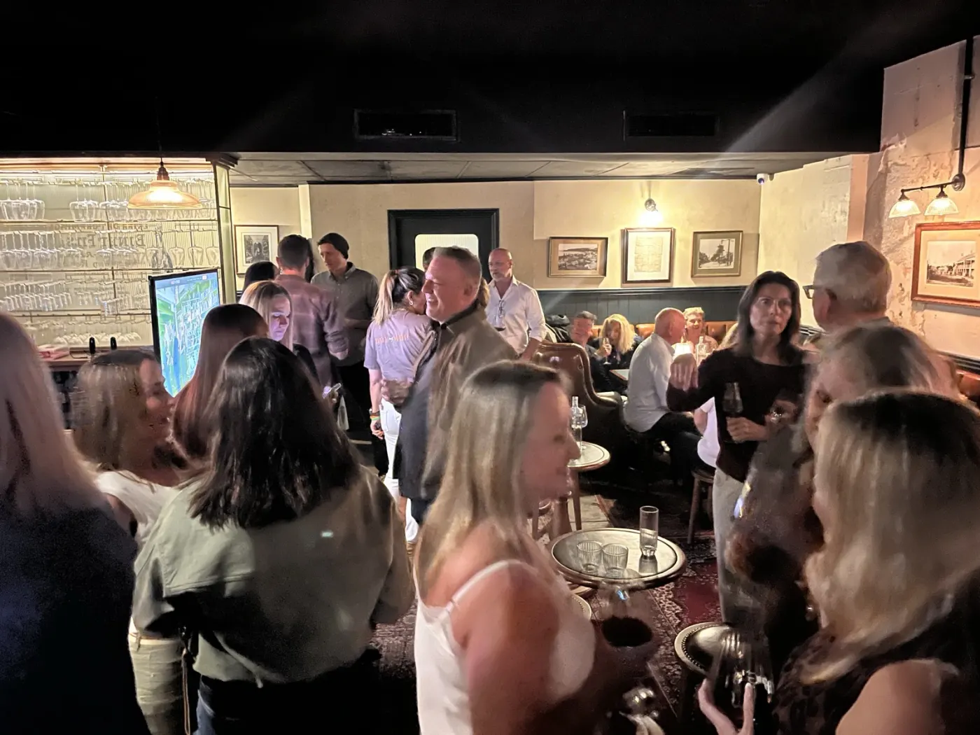 The mingle at a Date My Mate night at Henry G's Wine Parlour in Manly — the room on its feet, drinks in hand, talking in small groups